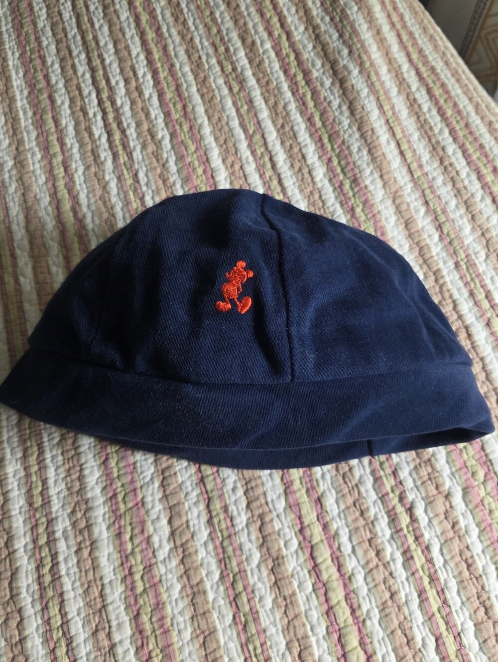 Disney Men's Navy Hat with Orange Embroidered Logo